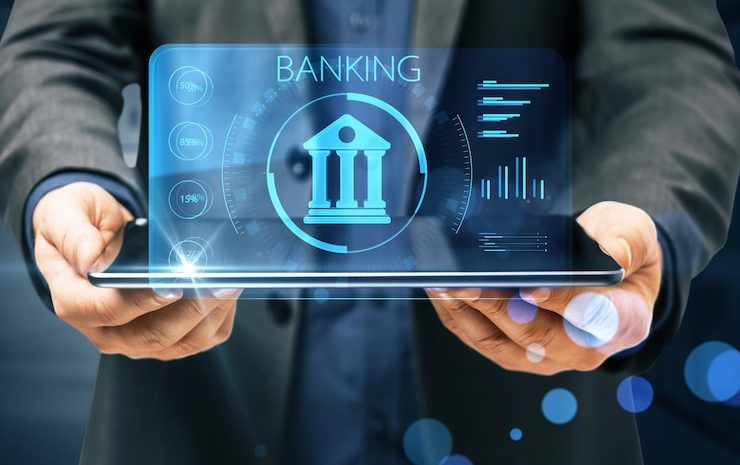online-banking-concept-with-digital-classic-bank-building-symbol-laptop-monitor-businessman-hands_670147-509